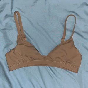 Skims triangle fits everybody clay